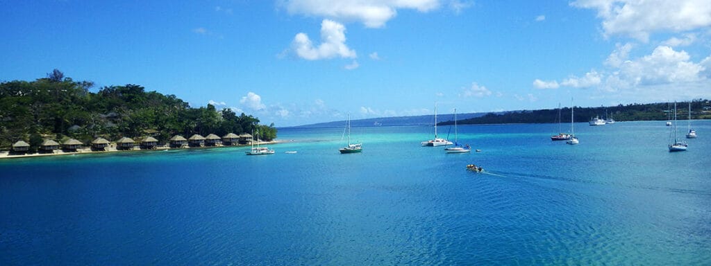 kava-vanuatu-island-ocean-4 Vanuatu Island bay with boats